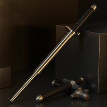 The durable metal shaft of the Folding Walking Stick demonstrating its strength against a brick.