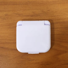 Comparison image highlighting compact size of portable sewing kit