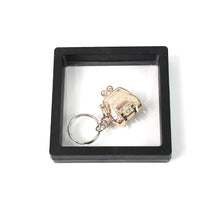 Mini nail clipper keychain in clear showcase with 3D floating effect