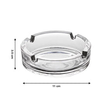 The classic design of this crystal glass ashtray adds sophistication.