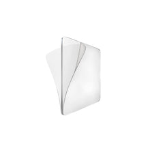 A single clear, square, double-sided adhesive sticker is shown peeling away from itself on a white background.