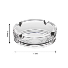 The classic design of this crystal glass ashtray adds sophistication.