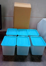 Empty square plastic container for versatile kitchen use.