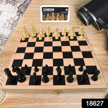 Close-up of the finely crafted wooden chess pieces in brown and yellow.