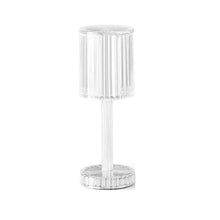 Contemporary crystal lamp illuminating a living room space with its unique design.