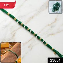Handmade green cotton thread rakhi for Raksha Bandhan