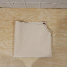 Person wearing waterproof apron while cooking in kitchen