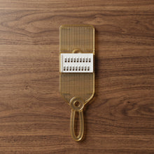 Handheld kitchen tool for vegetable and fruit slicing