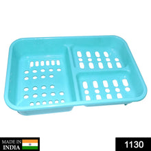 Organized bathroom counter featuring a multi-section plastic soap holder keeping bars dry.