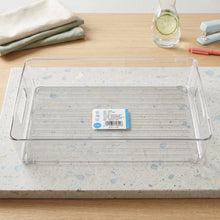Handle detail of clear plastic storage box