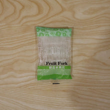 Set of disposable fruit forks for snacks and desserts