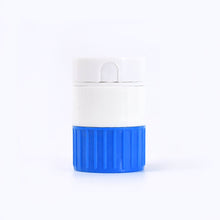 A white and blue pill crusher and cutter standing upright on a plain white background.