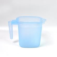 Transparent Bath Mug featuring convenient measurement lines.