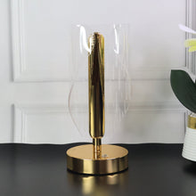 Decorative crystal LED table lamp placed on living room shelf
