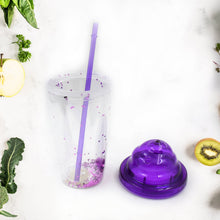 Portable travel tumbler featuring an ergonomic lid and reusable straw, available in vibrant colors.