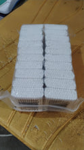 Detailed view of a bamboo cotton swab's pure cotton tip.