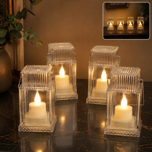 Four clear plastic lanterns with flameless LED candles casting a warm glow on a dark marble surface. Inset shows four