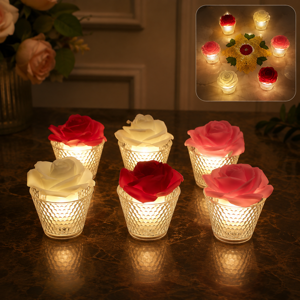 Six rose-shaped LED candles in clear textured holders, glowing in a dim room with a floral arrangement in the background.