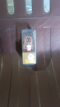 Cartoon pencil sharpener held in hand showing size and design