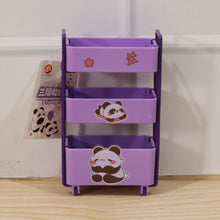 Mini storage trolley used to organize cosmetics on a dressing table.