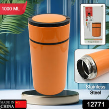 An Indian woman uses the 1000ml Stainless Steel Water Bottle with its convenient foldable handle for easy carrying.