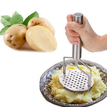 Close-up of the robust stainless steel masher, great for various boiled vegetables and dal.