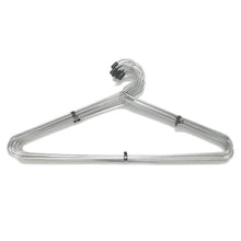 Stack of space-saving stainless steel hangers, highlighting their slim profile for closet organization.