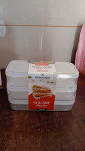 Konvex plastic lunch boxes filled with fresh fruits and vegetables, showcasing meal prep.