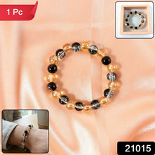 Dual-Tone Crystal Beaded Stretch Bracelet styled on wrist showcasing elegant sparkle
