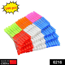 A large stack of colorful plastic clothes clips with a 