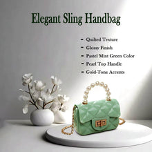 Mini fashion handbag highlighted by a decorative pearl handle and chain strap