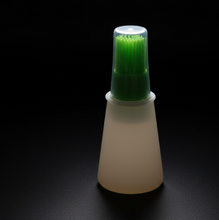 Product packaging for the Vastate silicone oil dispenser bottle.