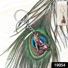 Close-up of detailed Bal Krishna crawling metal keychain