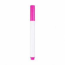 Close-up of fine tip of assorted colour marker pen for precision work.