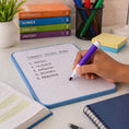 Vibrant dry erase marker with fine tip for clear writing on whiteboards.