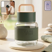 Glass bottle designed for office and travel hydration, with wide mouth