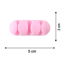 A single pink silicone cable organizer with four slots is shown with dimensions of 5 cm length and 2 cm width.