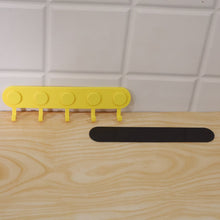 Self-adhesive five-hook hanger lifestyle view