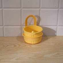Live photo of plastic hanging kitchen sink drain basket