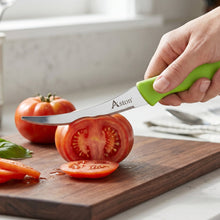 Kitchen knife in use for cutting vegetables or fruits