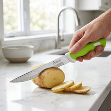 Hand slicing vegetables with 9-inch kitchen knife