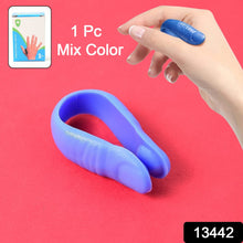 Close-up of the LI4 acupressure point clip being worn on a hand for headache relief.