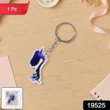 Close-up of glossy cartoon character acrylic keychain showing vibrant design