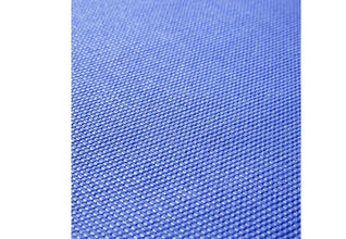 Eco-friendly Yoga Mat unrolled on a wooden floor.