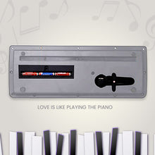 Close-up of the microphone input on the kids piano keyboard.