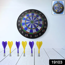 Close-up of magnetic dart board showing colorful target zones and numbers