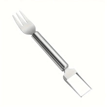Detailed view of watermelon cutter and serving fork