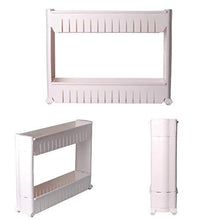 Detailed view of the smooth-gliding wheels and sturdy base of the slim storage rack.
