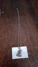 Elegant background for religious jewellery display.