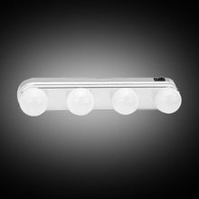 Compact LED vanity light attached to a mirror, showing even illumination.